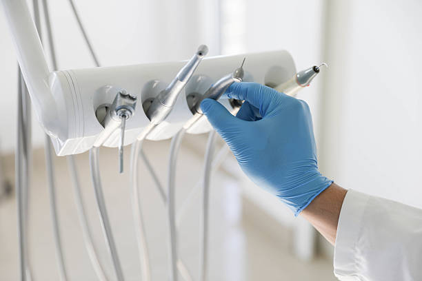 Professional Tooth Extraction technician working in Stillwater, OK